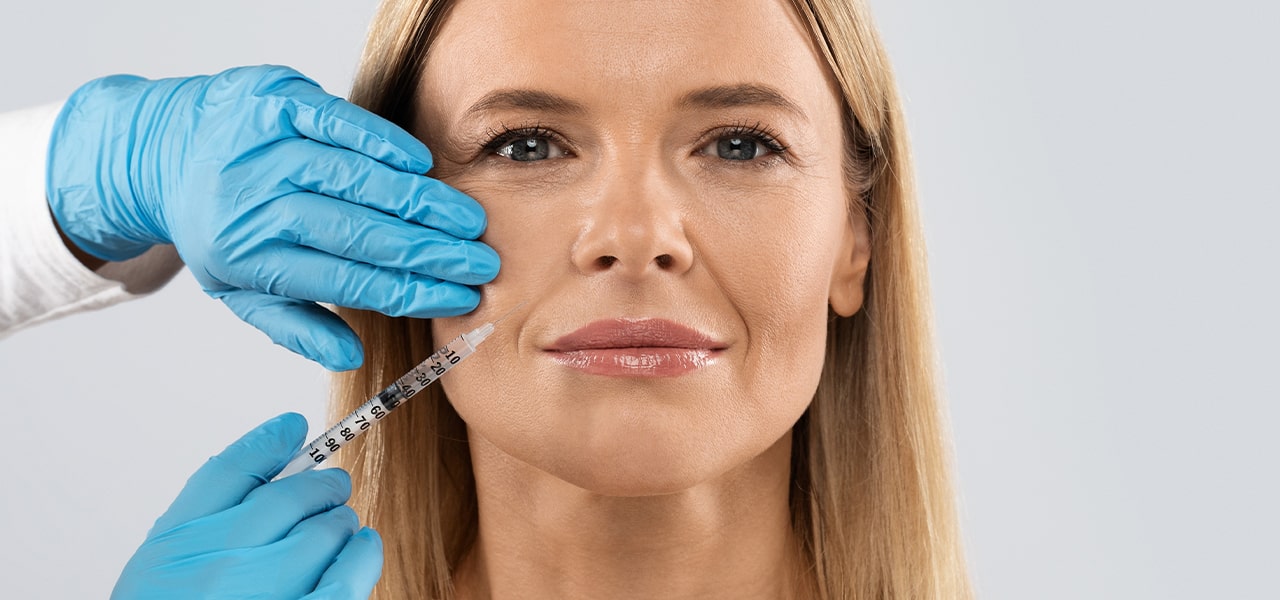 Woman getting a dermal filler treatment at NMVS